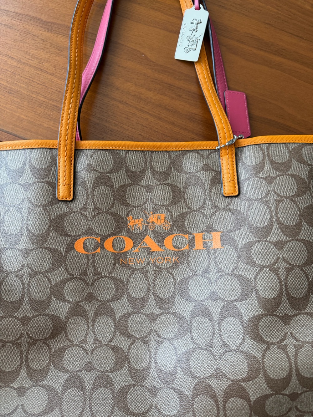 Coach Brown Signature Tote with Orange Trim and Pink Tag